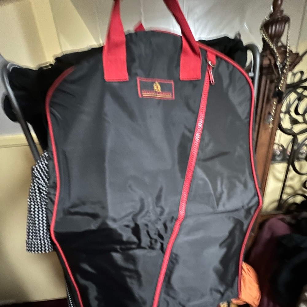 Brand-new, sealed Benson and hedges suit carrier